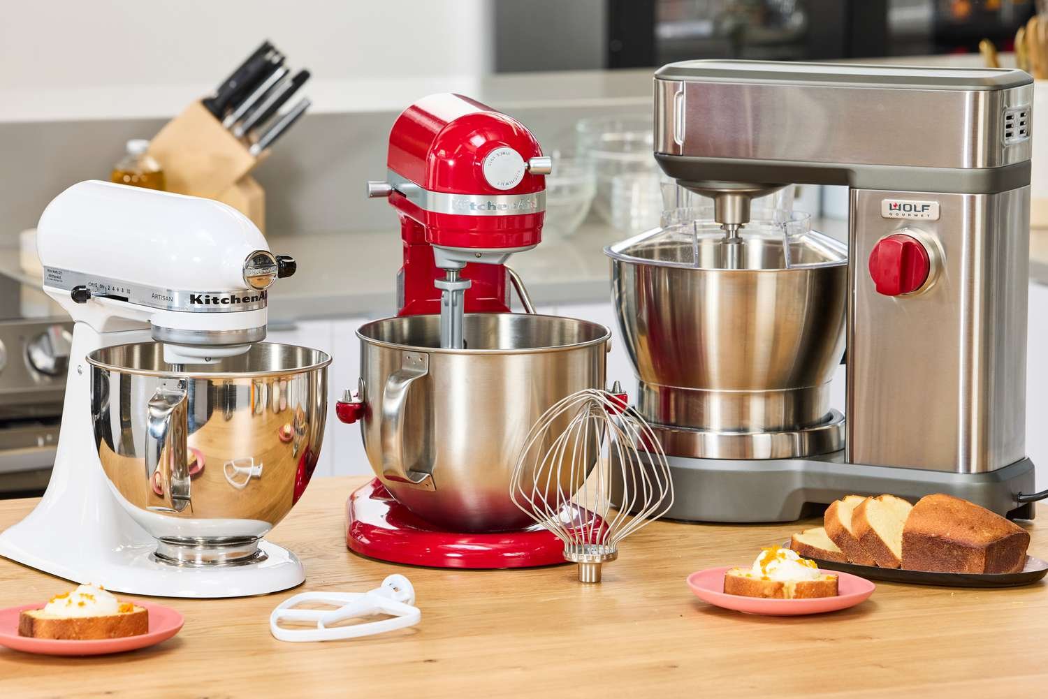 A modern metallic stand mixer on a marble countertop for the best stand mixers.