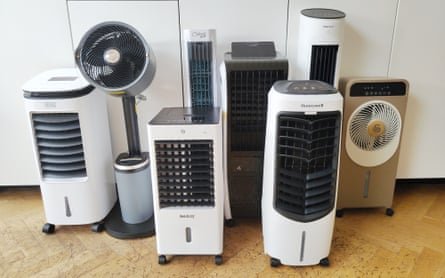 A modern white evaporative cooler in a bright, airy living room with natural lighting.